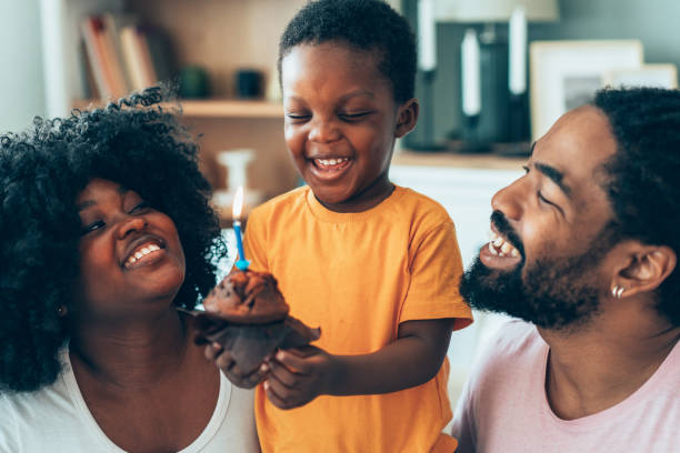istock Happy family celebrating birthday 2158013466