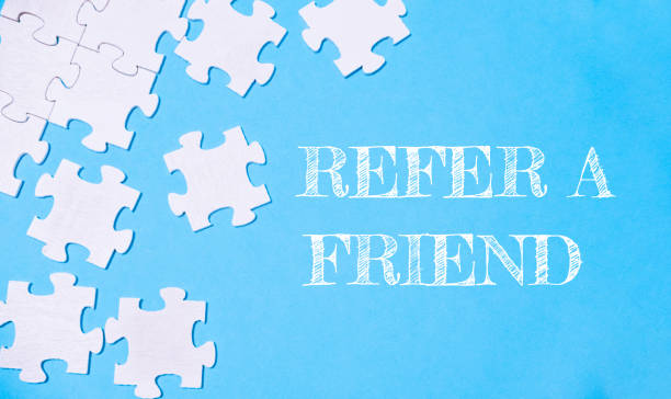 istock A puzzle with the words refer a friend written on it 2158013506