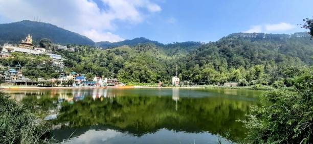istock a lake with the reflection of hills 2158015025