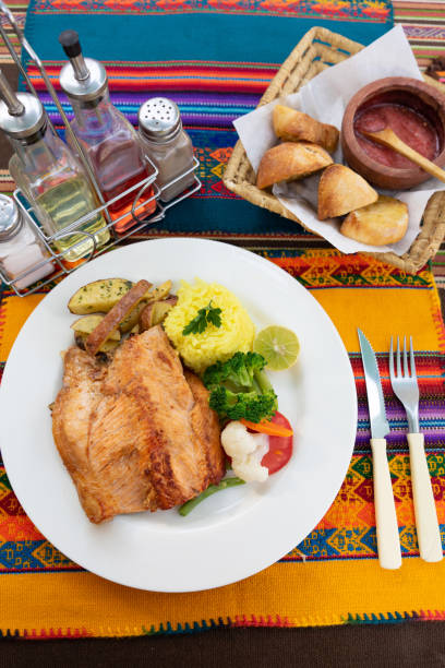 istock Traditional grilled trout on a typical tablecloth 2158015714