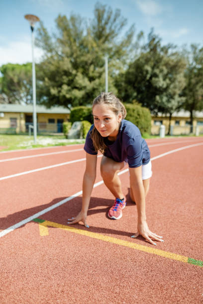 istock woman ready on the run track 2158016042