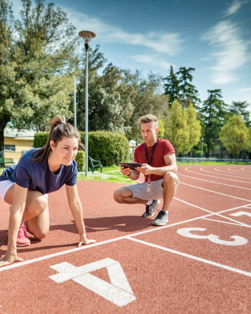 istock woman ready on the run track 2158016143