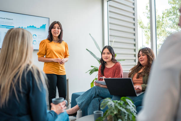 istock Professional Presentation by Hispanic Businesswoman 2158016310