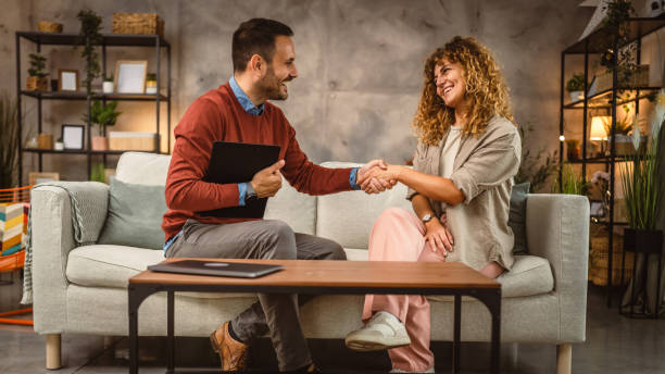 istock Man financial adviser shake hands with woman customer, client 2158017291