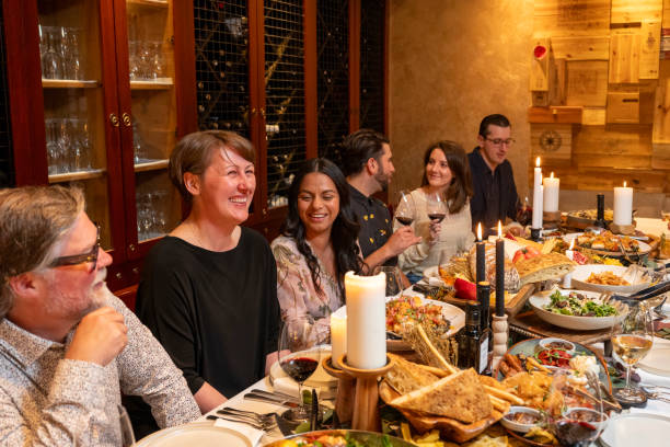 istock Friends enjoy luxury meal at restaurant 2158018338