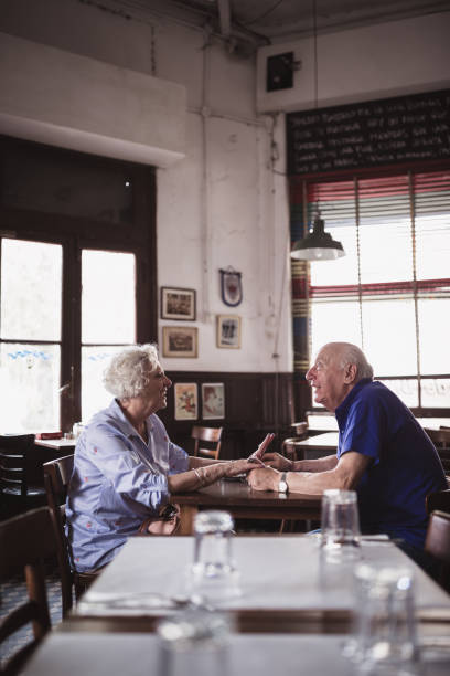 istock Casual Morning Conversation in Cozy Cafe 2158019630