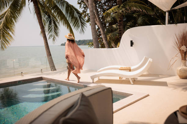 istock Woman on vacation in paradise 2158022499