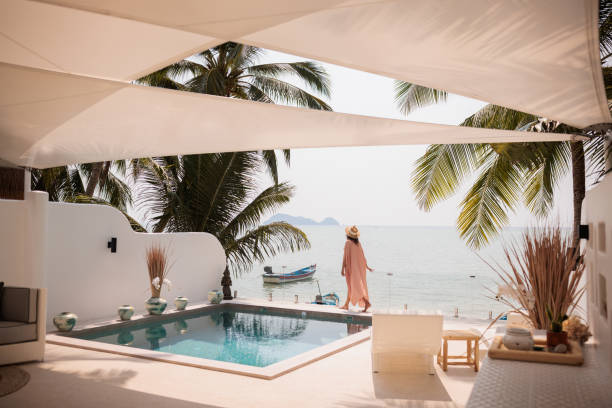 istock Woman on vacation in paradise 2158022624