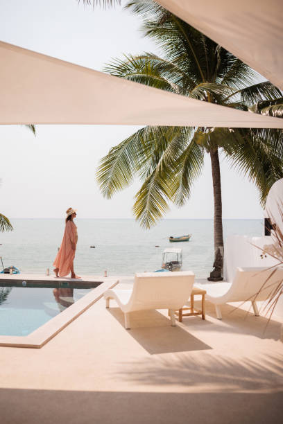 istock Woman on vacation in paradise 2158022707