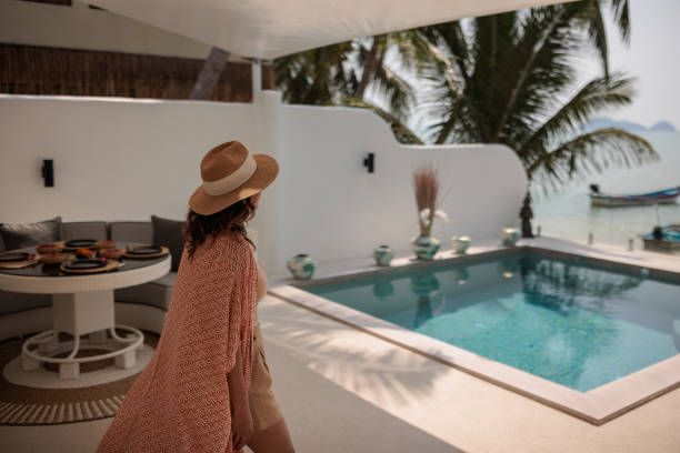 istock Woman on vacation in paradise 2158023243