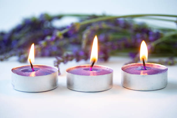 lavender bouquet and aroma Candle.  white background.