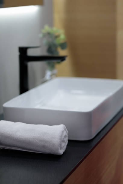 istock bath towel near vessel bathroom sink 2158025947