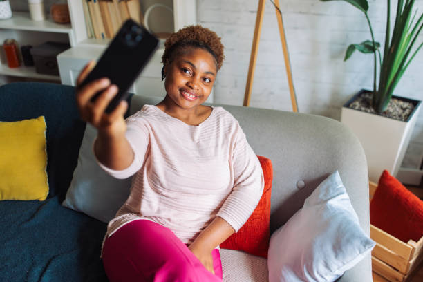 istock Connected and Comfortable: A Moment of Digital Leisure 2158029915