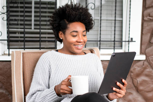 istock Woman working on a digital tablet in the new normal 2158038137
