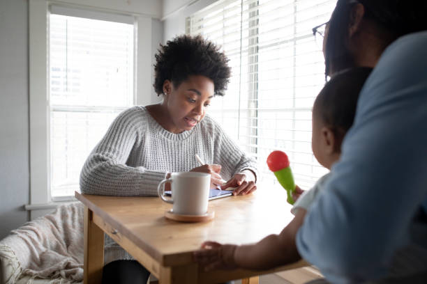 istock Mom working from home during covid19 lockdown 2158038177