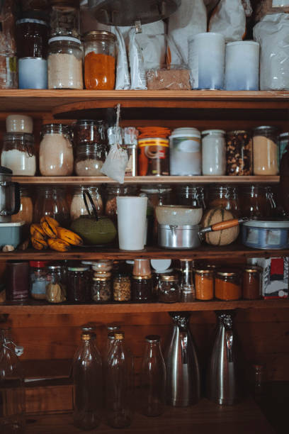 istock Snacks and ingredients in glass containers on a shelf 2158038267