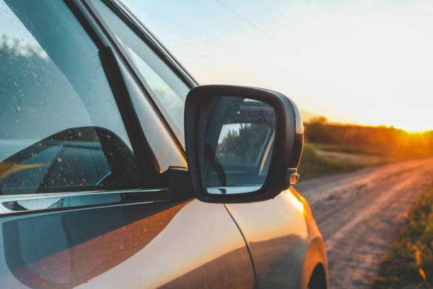 istock Reflected road in rearview mirror, tourism concept 2158039765