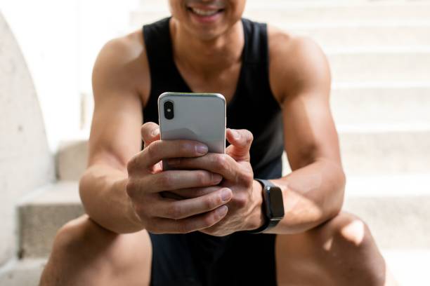 istock Asian man on a mobile phone 2158040376