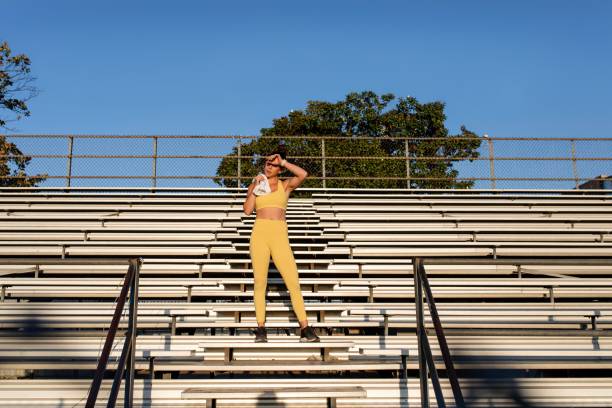 istock Woman athlete resting after a workout 2158040728