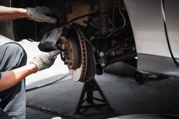 istock A man is working on a car's wheel 2158040760