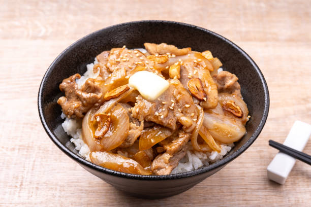 istock Garlic and butter pork rice bowl 2158041547