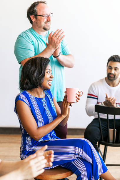istock People clapping their hands in a meeting 2158042993