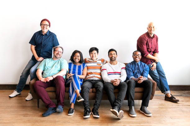 istock Group of people sitting on a couch 2158043033