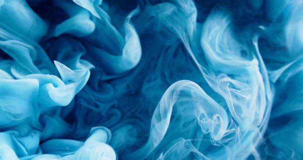 istock Ink splash water color cloud blue smoke floating 2158043465