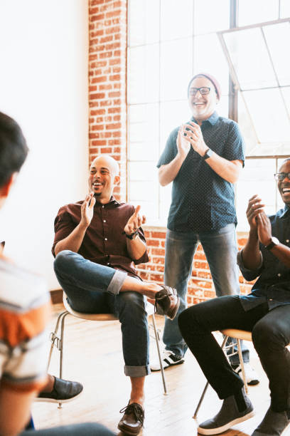 istock People clapping their hands in a meeting 2158043544