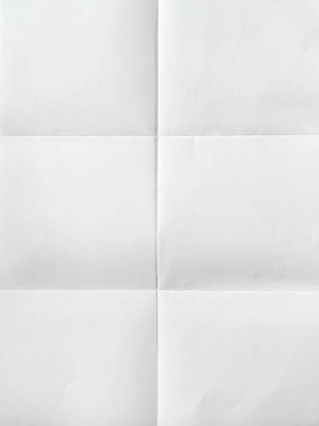 istock white sheet of paper folded in six With texture. 2158043818