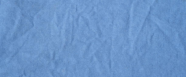 istock Blue cotton fabric texture background, Wrinkle surface textile, wallpaper, banner 2158044551