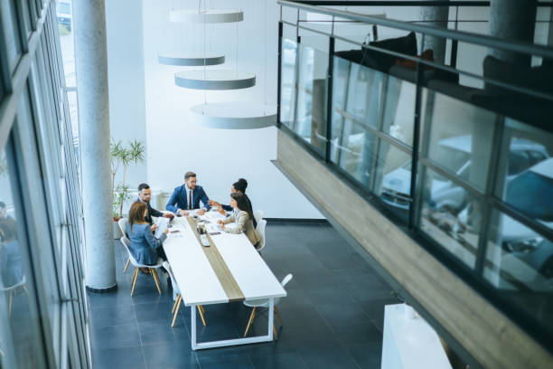 istock High angle view of corporate team meeting 2158044592