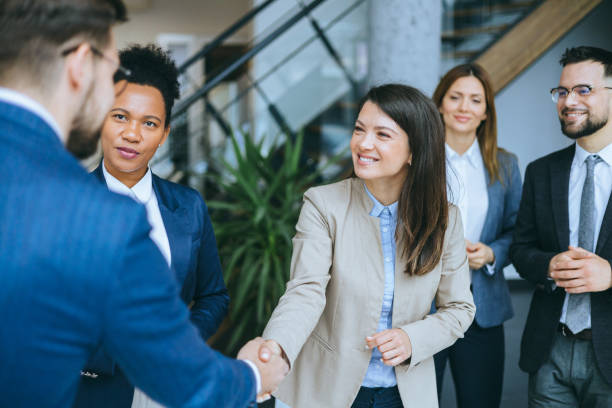 istock Business team greeting with a handshake 2158044598