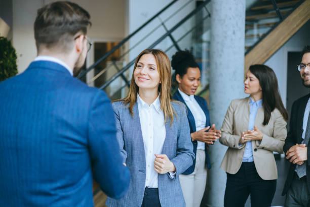 istock A business people having a handshake in a office meeting 2158044600