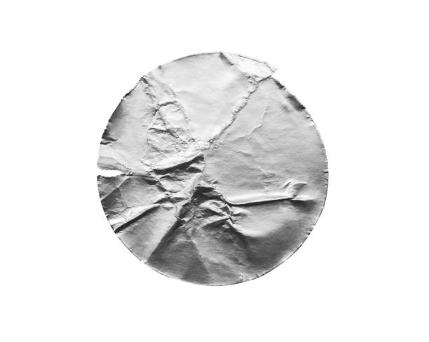 istock Blank silver round adhesive paper metallic sticker label isolated on white background 2158044626