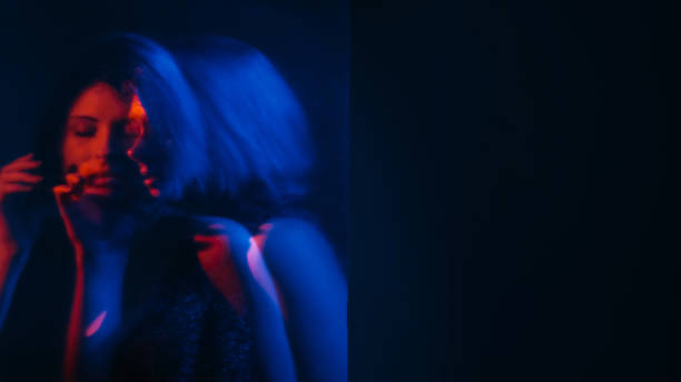 istock Mental pain defocused silhouette woman neon blue 2158044794