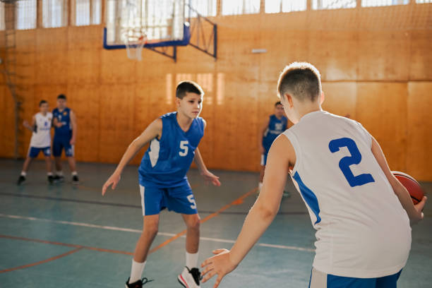 istock Young basketball players strategic play 2158044907