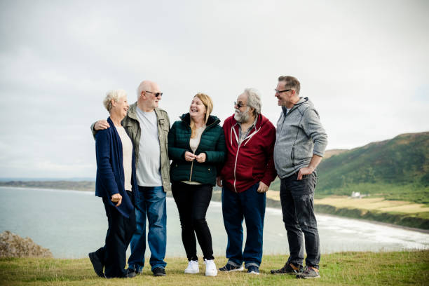 istock Happy senior people enjoying together 2158044923