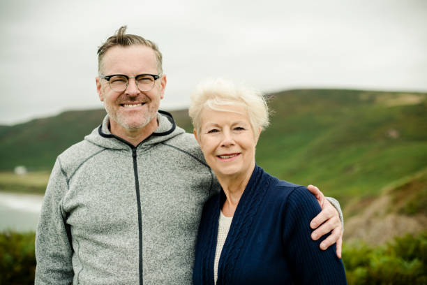 istock Happy senior couple standing together 2158044949