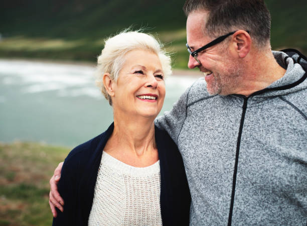 istock Happy senior couple standing together 2158044950
