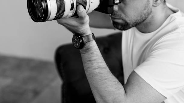 istock Professional photographer shooting at home 2158044975