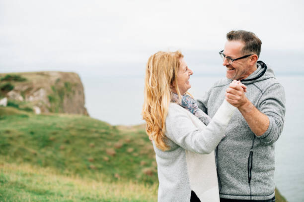 istock Romantic senior couple dancing outdoors 2158045049