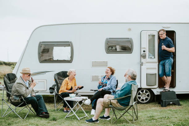 istock Group of senior people gathering outside a trailer 2158045095