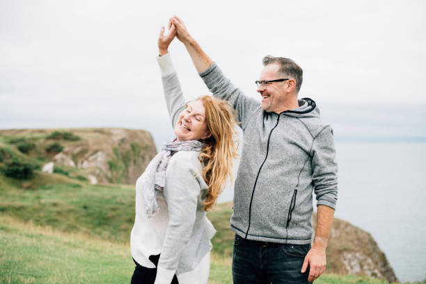 istock Romantic senior couple dancing outdoors 2158045104
