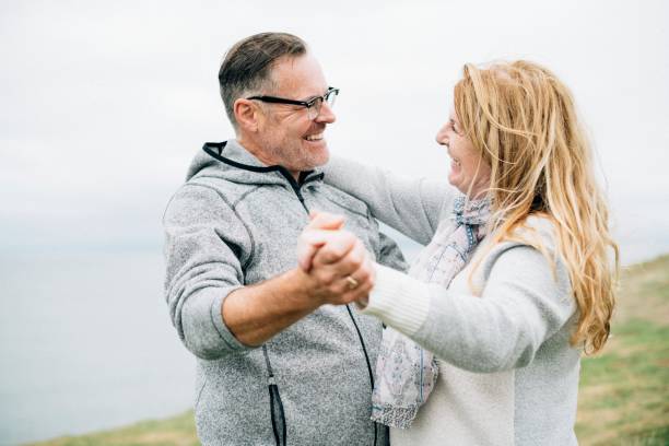 istock Romantic senior couple dancing outdoors 2158045153