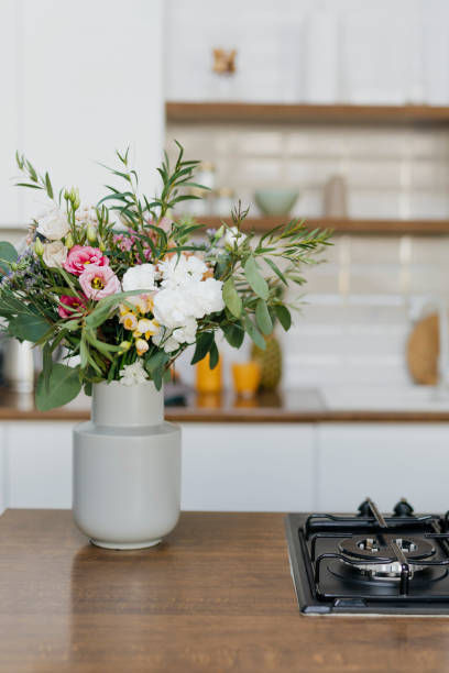 istock Elegant modern kitchen with a flower pot 2158045258