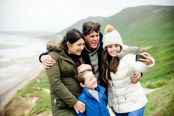 istock Happy family taking a selfie 2158045582