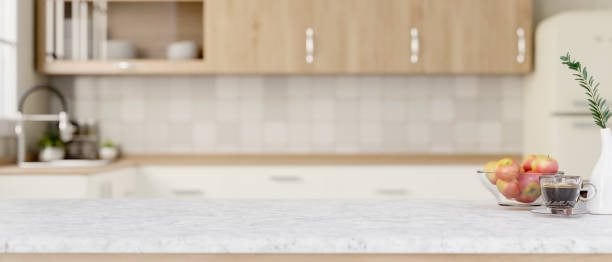 istock A copy space on a white marble kitchen tabletop in a contemporary minimalist kitchen. 2158046131