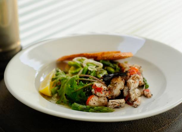 Thai food is generally known for being very spicy but this noodle salad can be milder if you put in the request. One of my favourite Thai dishes as it comes with lots of seafood and crunchy vegetables. Shrimp, squid and raw onion. And coriander is scattered on the top of it. It might look like bee hoon but it is glass noodle made from mung bean starch.
