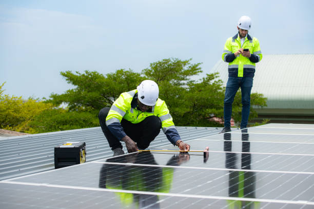 istock Engineer and technician inspects solar panel installation and test the operation of the panel 2158046809